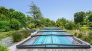 Prix d’un abri de piscine plat : tarifs 2026