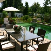 Photos de piscines avec terrasse / salon de jardin