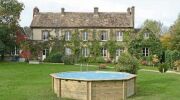 Une piscine bois ronde pour les petits jardins